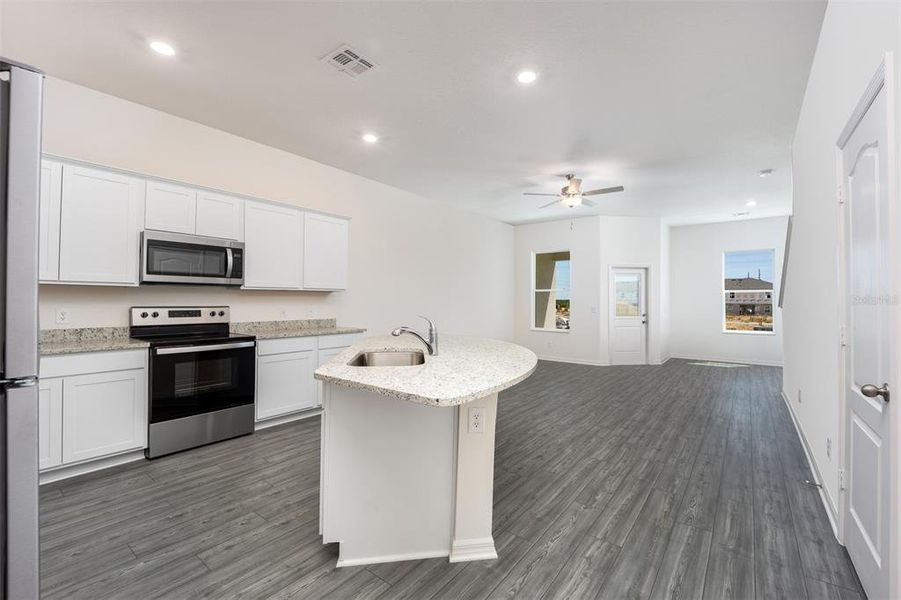 Furnished interior view inside a new home in Sol Vista, Dundee (Image 9).