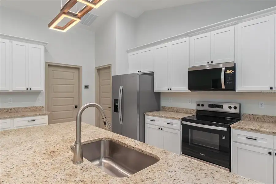 Furnished interior view inside a new home in , Ocala (Image 10).