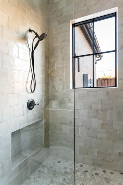 Bathroom with a tile shower