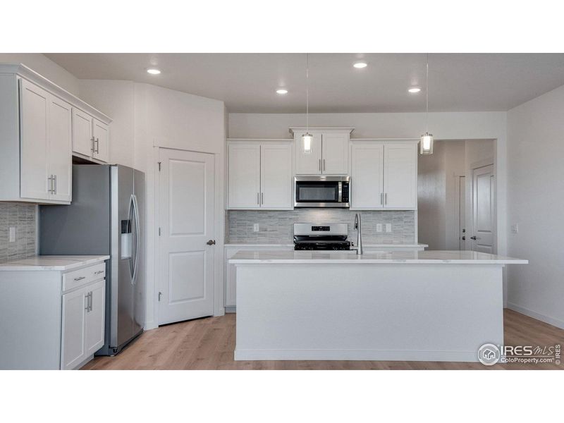 Furnished interior view inside a new home in Vantage, Berthoud (Image 7). Furnished interior view inside a new home in Vantage, Berthoud (Image 7).