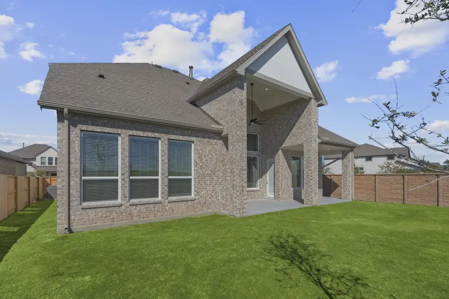 Representative exterior details of a home built from the Waterford by Chesmar Homes in Meridiana 60's, Manvel (Image 4).