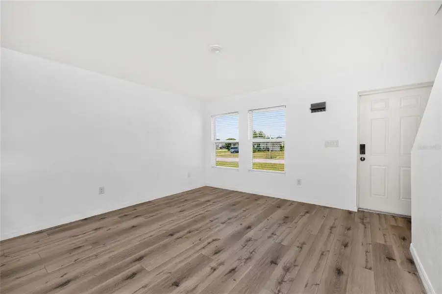 Spacious, unfurnished interior of a new home in , Port Charlotte (Image 21).