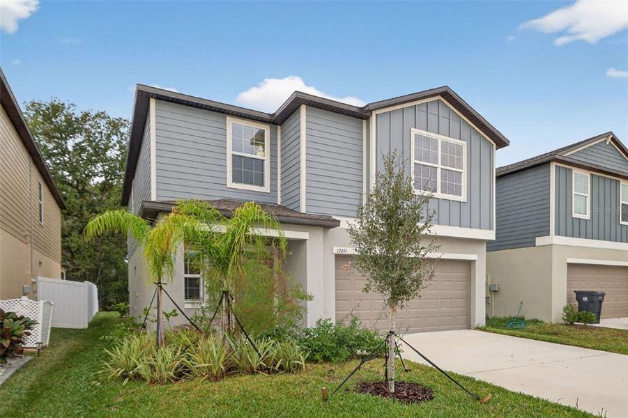 Front exterior of a new home in , Riverview, FL, highlighting curb appeal (Image 27).