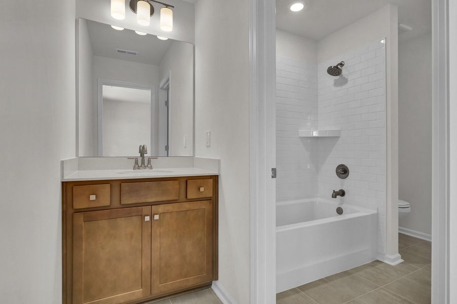 Furnished interior view inside a new home in Grand Park, Leland (Image 11).