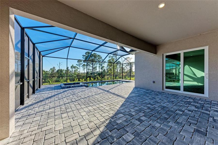 Exterior details and patio area of a home in Wellen Park Golf & Country Club: Executive Homes, Venice (Image 24).