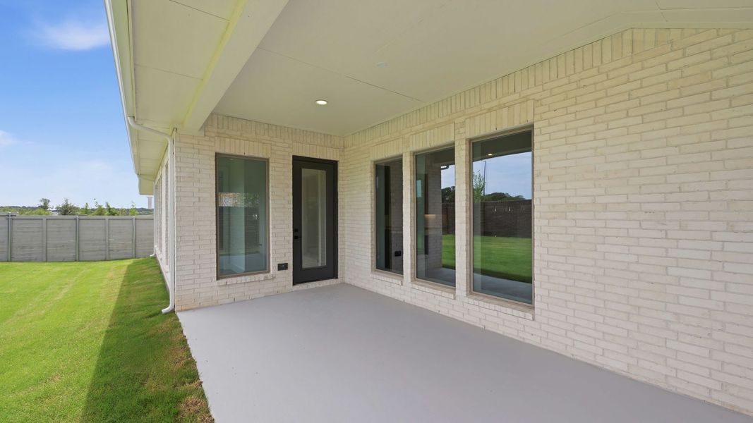 Exterior details and patio area of a home in Landmark, Denton (Image 4). Exterior details and patio area of a home in Landmark, Denton (Image 4).