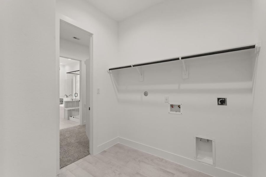 Representative unfurnished interior of a home built from the Sorenstam by Chesmar Homes in Riceland Alley Loads, Mont Belvieu (Image 69).
