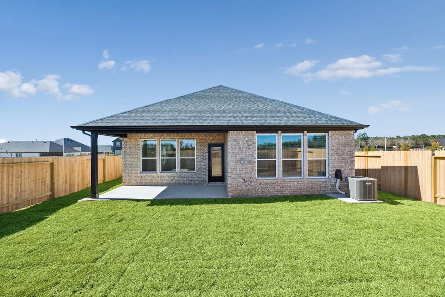 Exterior details and patio area of a home in Montgomery Bend, Montgomery (Image 4).