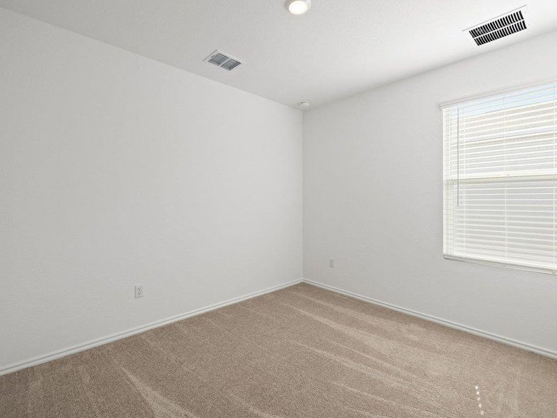 Unfurnished room featuring carpet and baseboards