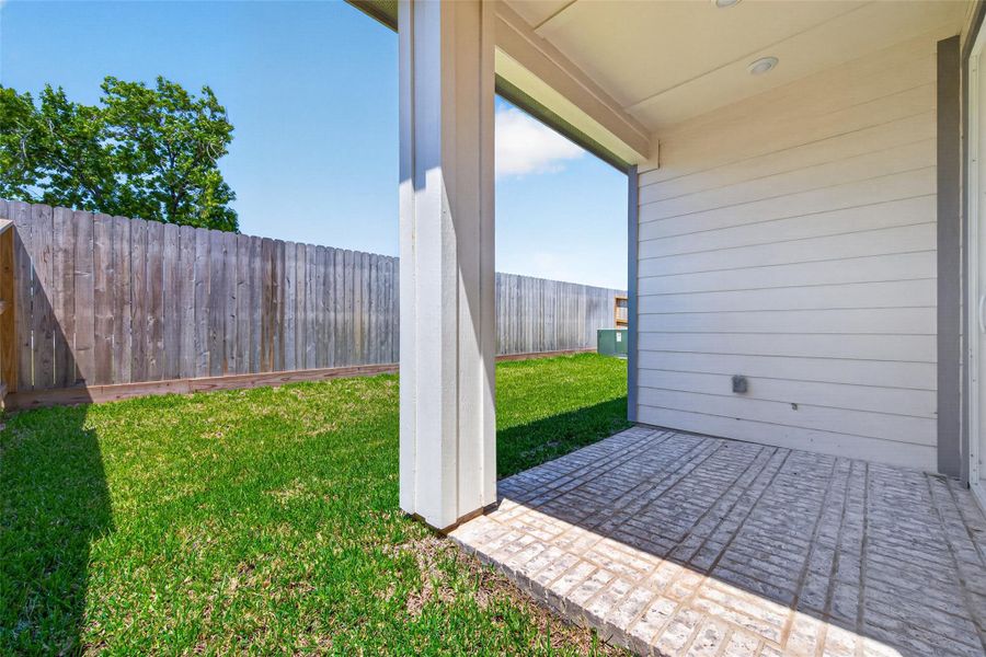 Exterior details and patio area of a home in , Stafford (Image 4). Exterior details and patio area of a home in , Stafford (Image 4).