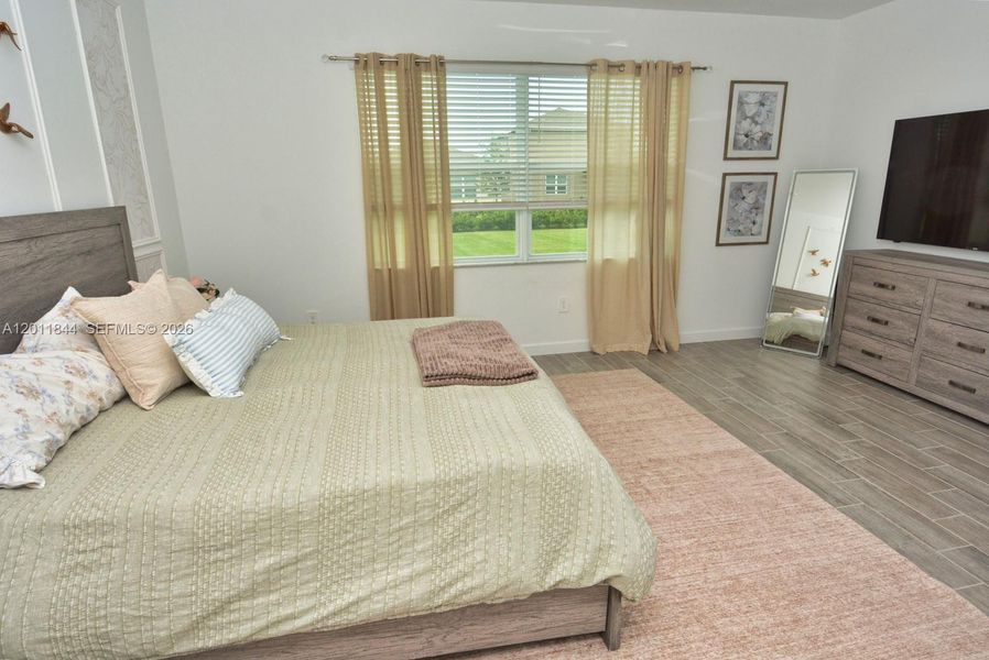 Furnished interior view inside a new home in Central Park, Port St. Lucie (Image 29).