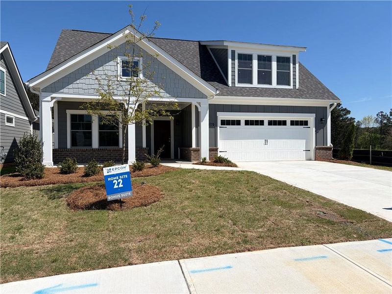 Front exterior of a new home in The Courtyards at Bailey Farms, Dacula, GA, highlighting curb appeal (Image 1). Front exterior of a new home in The Courtyards at Bailey Farms, Dacula, GA, highlighting curb appeal (Image 1).