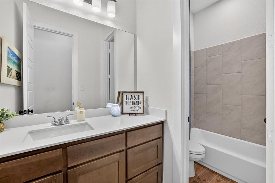 Hall bath shared by bedroom #3 and #2 Hall bath shared by bedroom #3 and #2
