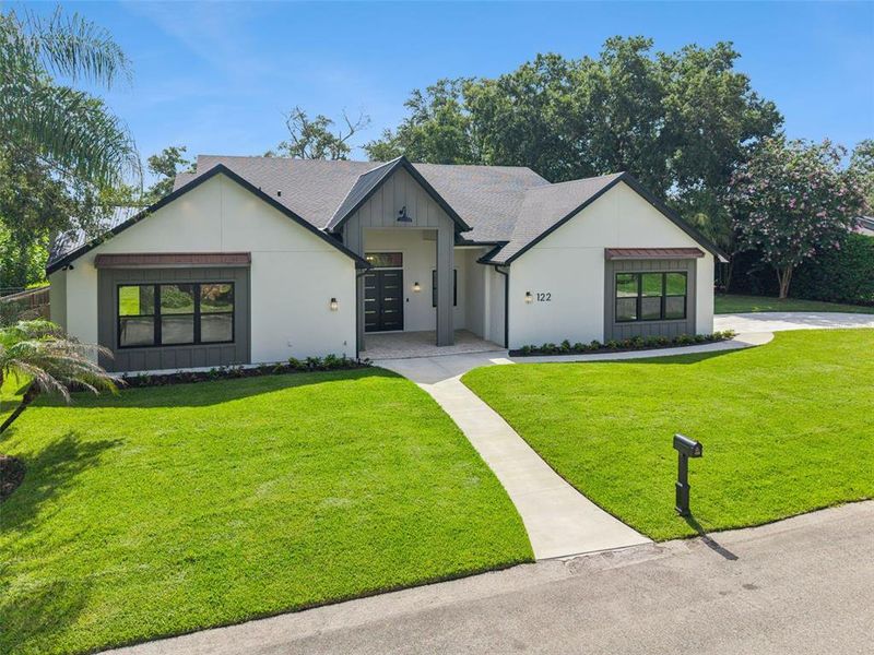 Front exterior of a new home in , Altamonte Springs, FL, highlighting curb appeal (Image 31). Front exterior of a new home in , Altamonte Springs, FL, highlighting curb appeal (Image 31).