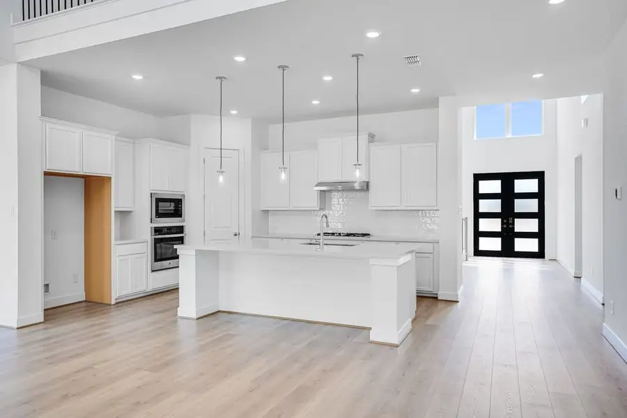 Furnished interior view inside a new home in Avalon at Cypress, Cypress (Image 6).