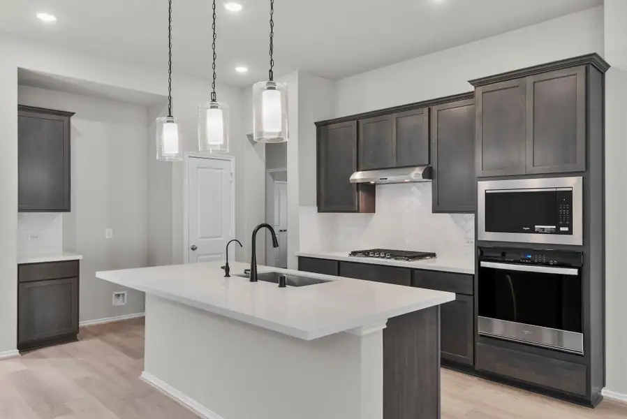 Furnished interior view inside a new home in Grand Central Park, Conroe (Image 7).