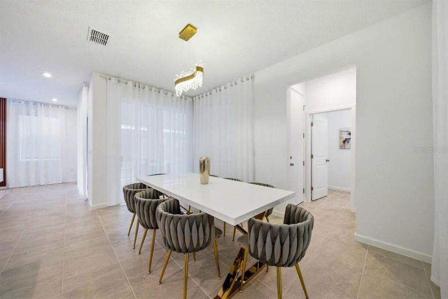 Furnished interior view inside a new home in Solara Resort, Kissimmee (Image 9).