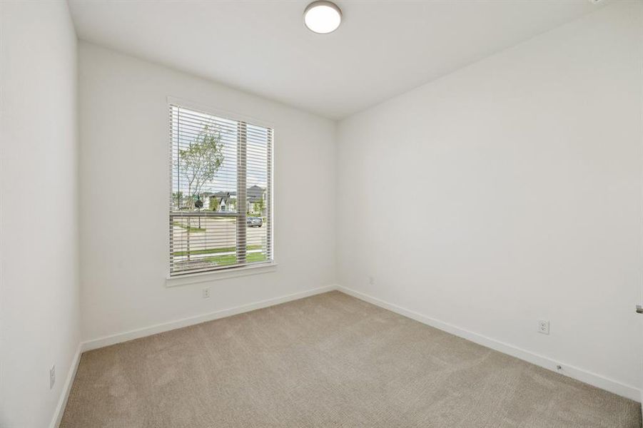 Bedroom in the Monet II home plan by Trophy Signature Homes – REPRESENTATIVE PHOTO