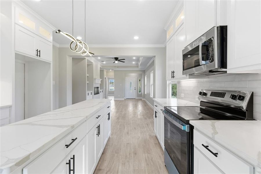 Furnished interior view inside a new home in , Tom Bean (Image 5).