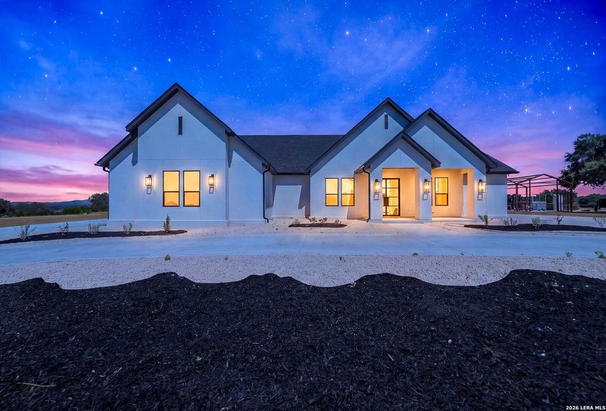 Front exterior of a new home in , Bandera, TX, highlighting curb appeal (Image 29). Front exterior of a new home in , Bandera, TX, highlighting curb appeal (Image 29).