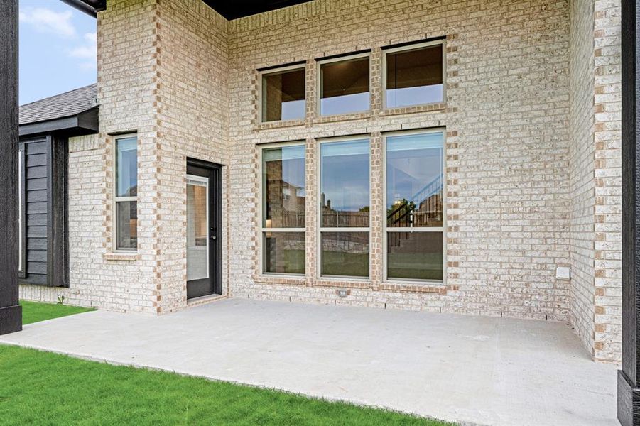 Front exterior of a new home in Sunrise at Garden Valley 60-79, Waxahachie, TX, highlighting curb appeal (Image 24).