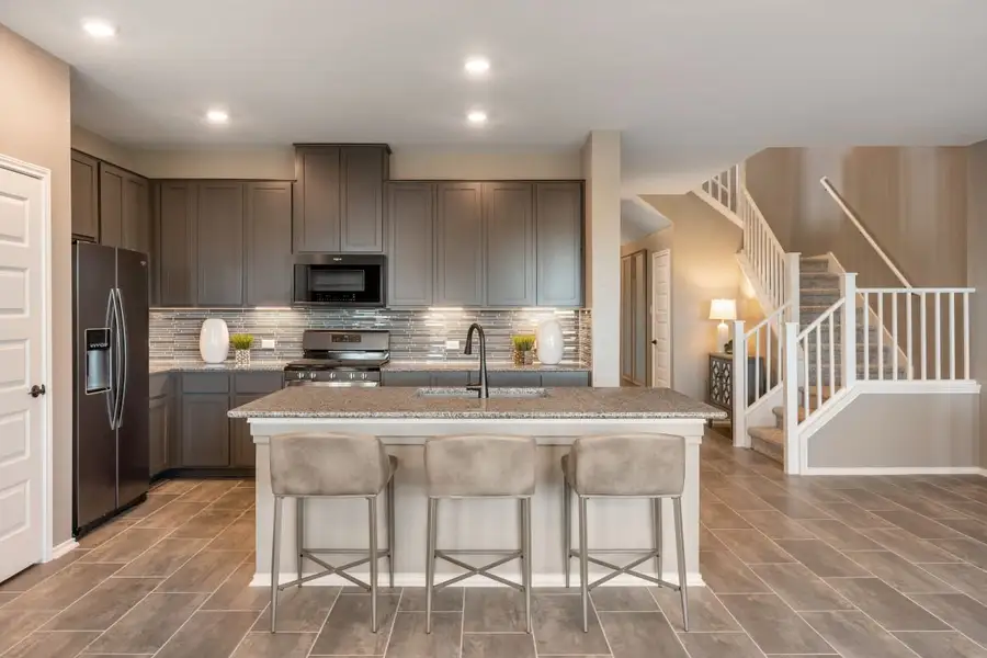Representative furnished interior of a home built from the 2500 Modeled by KB Home in Salerno - Classic Collection, Round Rock (Image 6).