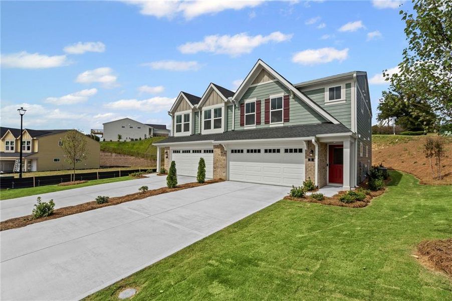Front exterior of a new home in Villas at Gold Creek, Dawsonville, GA, highlighting curb appeal (Image 2).