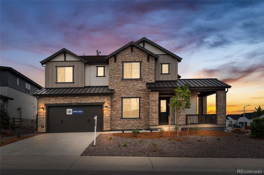 Front exterior of a new home in Sterling Ranch, Littleton, CO, highlighting curb appeal (Image 20).