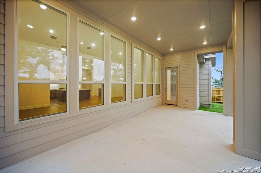 Exterior details and patio area of a home in Davis Ranch: 60ft. lots, San Antonio (Image 17).