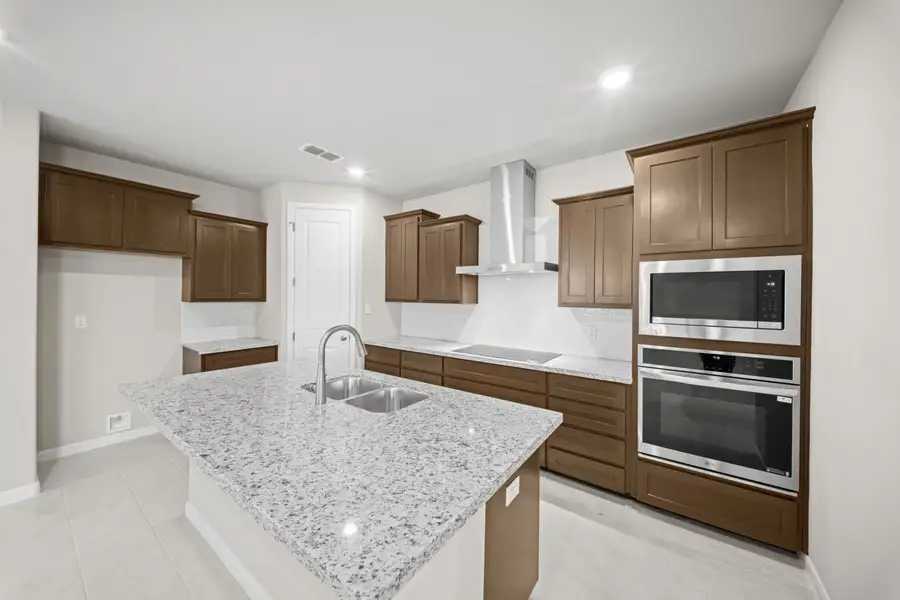Furnished interior view inside a new home in Monte Cielo, Weslaco (Image 5).