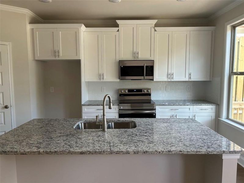 Furnished interior view inside a new home in Towns at Enclave, Lawrenceville (Image 10).