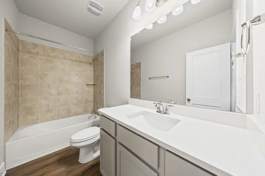 Representative furnished interior of a home built from the Caden by Omega Builders in North Point, Temple (Image 12).