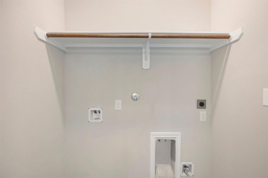 Laundry room (*Photo not of actual home and used for illustration purposes only.)