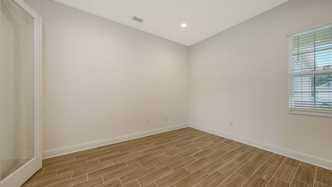 Spacious, unfurnished interior of a new home in Wildleaf at North River Ranch, Parrish (Image 26).