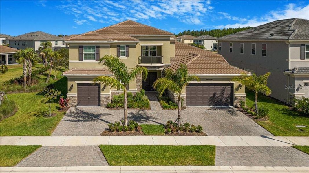 Front exterior of a new home in , Wesley Chapel, FL, highlighting curb appeal (Image 8).