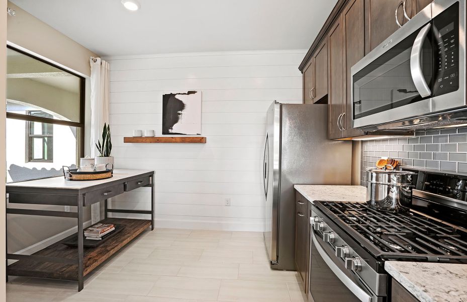 Kitchen with loads of cabinets for storage Kitchen with loads of cabinets for storage