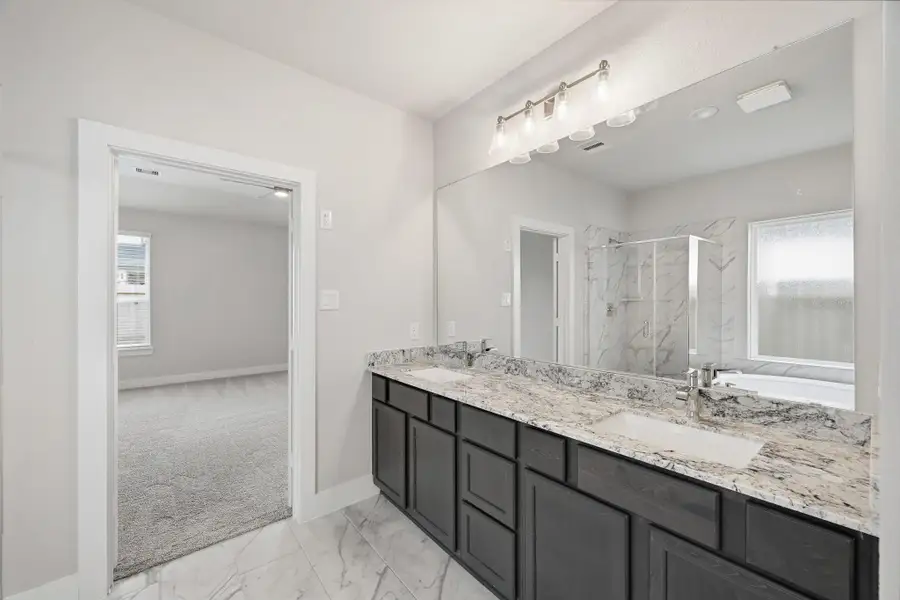 Furnished interior view inside a new home in Barton Creek Ranch, Conroe (Image 10).