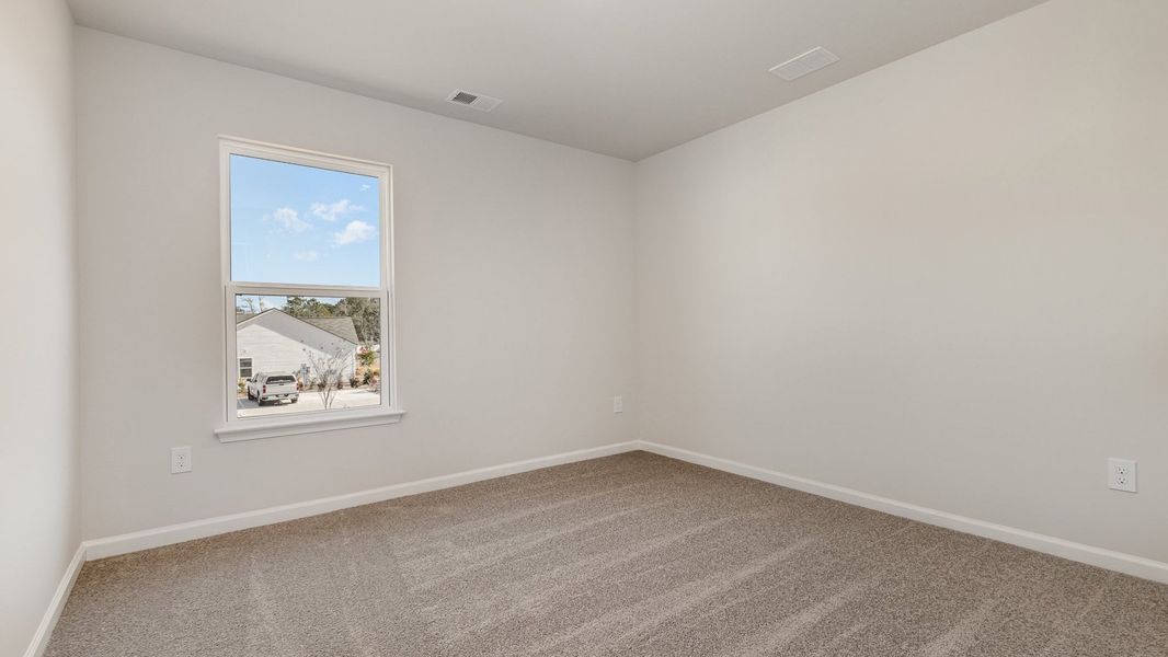 Spacious, unfurnished interior of a new home in Sandridge Park, Little River (Image 20).