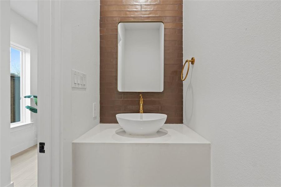 Half bathroom featuring vanity Half bathroom featuring vanity