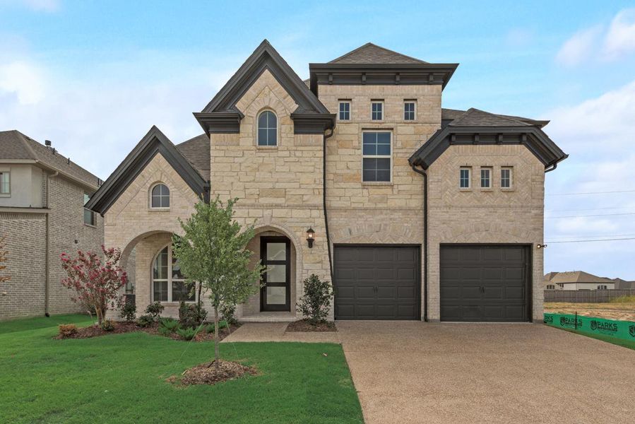 Front exterior of a new home in Dominion of Pleasant Valley, Wylie, TX, highlighting curb appeal (Image 1). Front exterior of a new home in Dominion of Pleasant Valley, Wylie, TX, highlighting curb appeal (Image 1).