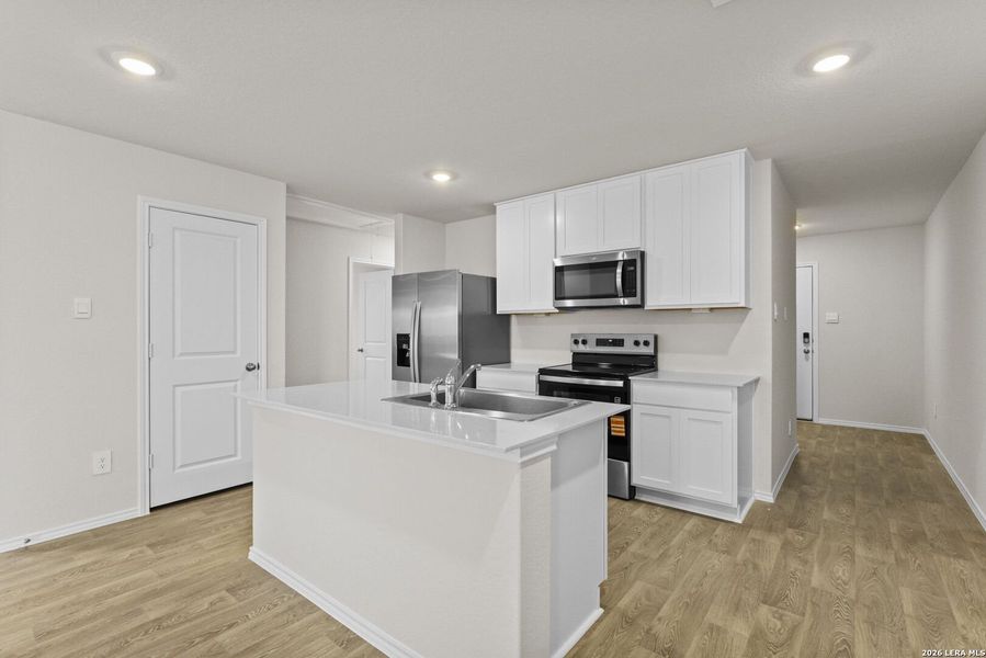 Furnished interior view inside a new home in Swenson Heights, Seguin (Image 4).