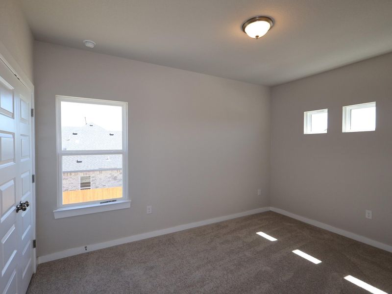 Spacious, unfurnished interior of a new home in Cedar Brook, Leander (Image 8).