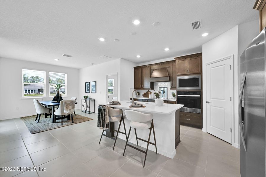 Furnished interior view inside a new home in Hyland Trail, Green Cove Springs (Image 5).