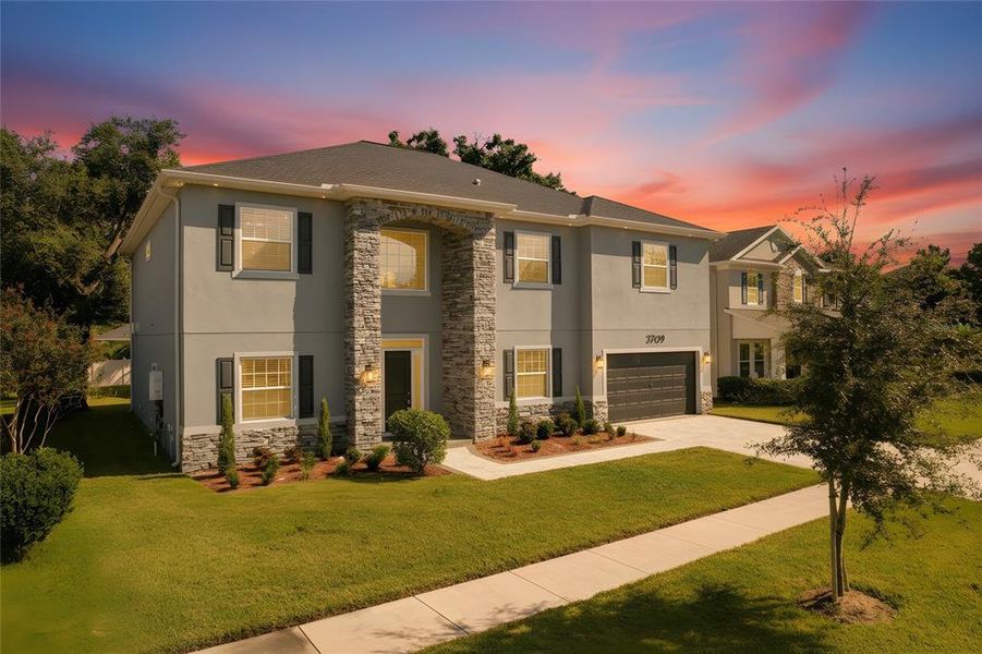 Front exterior of a new home in , Tampa, FL, highlighting curb appeal (Image 2).