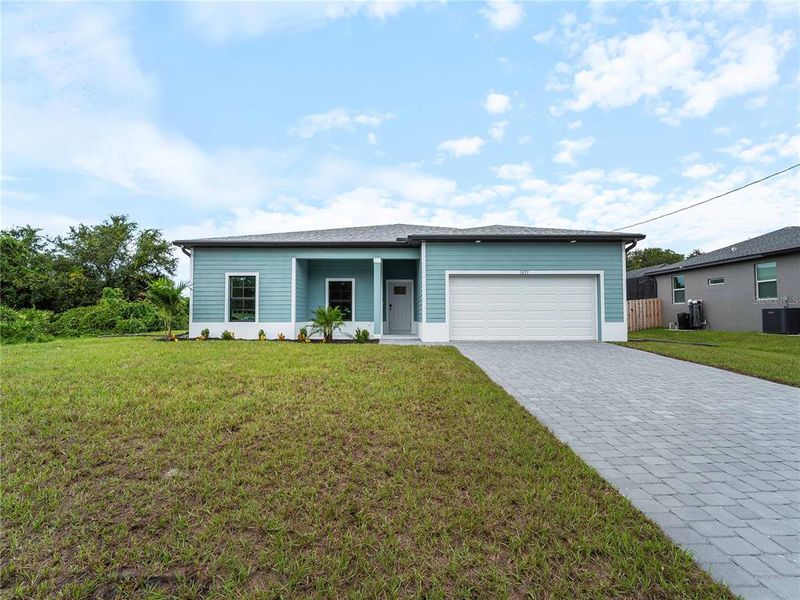Exterior details and patio area of a home in , North Port (Image 25).