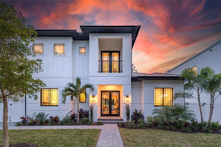 Front exterior of a new home in , Sarasota, FL, highlighting curb appeal (Image 22).