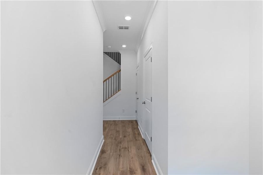 Coming into home from front door - Entry way - good for drop zone for shoes, hats, keys, umbrellas, coats, etc. 
Pictures represent a previously built home - Move in Ready Home