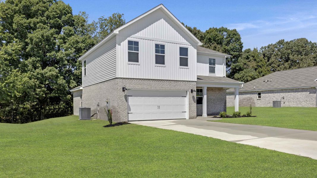 Front exterior of a new home in Bailey Park, Fayetteville, TN, highlighting curb appeal (Image 22). Front exterior of a new home in Bailey Park, Fayetteville, TN, highlighting curb appeal (Image 22).