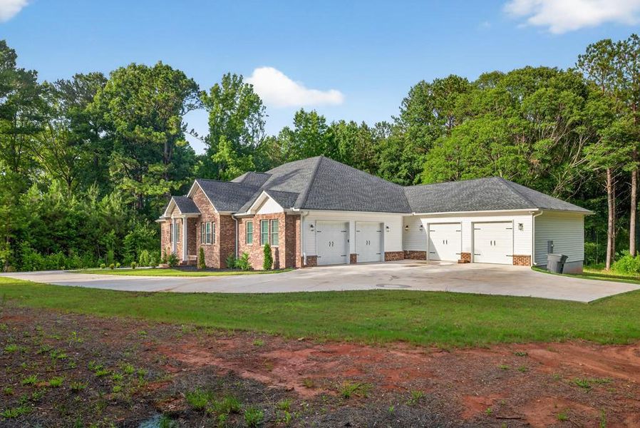 Front exterior of a new home in , Oxford, GA, highlighting curb appeal (Image 34). Front exterior of a new home in , Oxford, GA, highlighting curb appeal (Image 34).