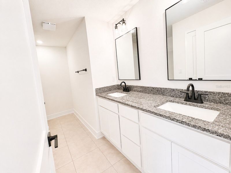 Furnished interior view inside a new home in Harmony Central, St. Cloud (Image 9).